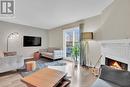 36 Greenboro Crescent, Ottawa, ON  - Indoor Photo Showing Living Room With Fireplace 