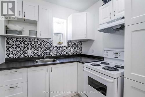 881 Lakeshore Road E, Mississauga, ON - Indoor Photo Showing Kitchen With Double Sink