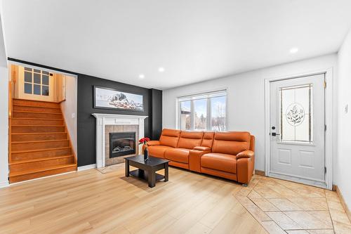 Salon - 1363  - 1367 Rue Dollard, Terrebonne (Lachenaie), QC - Indoor Photo Showing Living Room With Fireplace