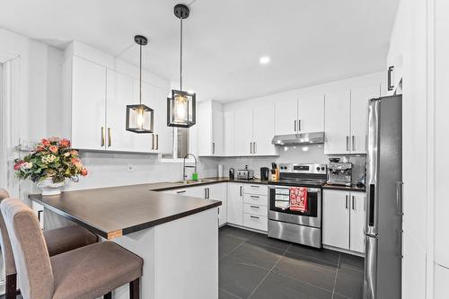 Cuisine - 1363  - 1367 Rue Dollard, Terrebonne (Lachenaie), QC - Indoor Photo Showing Kitchen With Upgraded Kitchen