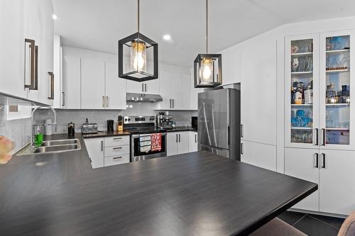 Cuisine - 1363  - 1367 Rue Dollard, Terrebonne (Lachenaie), QC - Indoor Photo Showing Kitchen With Double Sink With Upgraded Kitchen