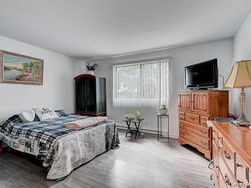 Chambre à coucher principale - 204-2475 Av. Aumont, Brossard, QC - Indoor Photo Showing Bedroom