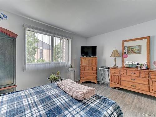 Chambre à coucher principale - 204-2475 Av. Aumont, Brossard, QC - Indoor Photo Showing Bedroom