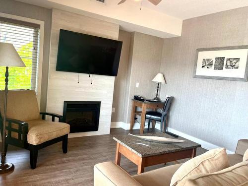 36B-1200 Rancher Creek Road, Osoyoos, BC - Indoor Photo Showing Living Room With Fireplace