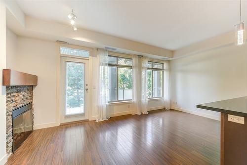 209-3521 Carrington Road, West Kelowna, BC - Indoor With Fireplace