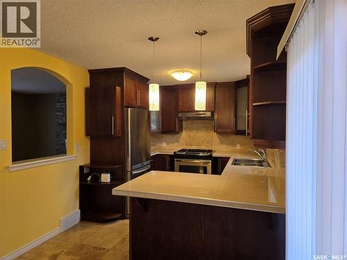 433 Guelph Crescent, Saskatoon, SK - Indoor Photo Showing Kitchen With Double Sink