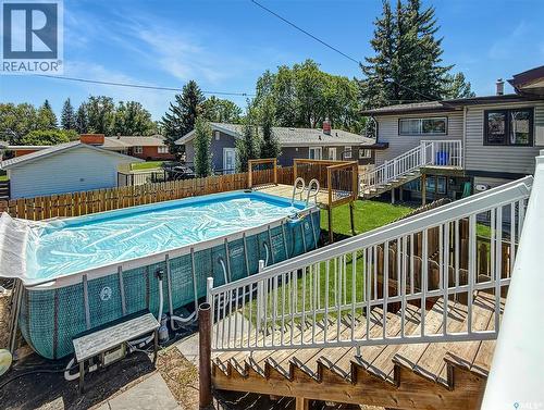 1311 Jubilee Drive, Swift Current, SK - Outdoor With Above Ground Pool With Deck Patio Veranda