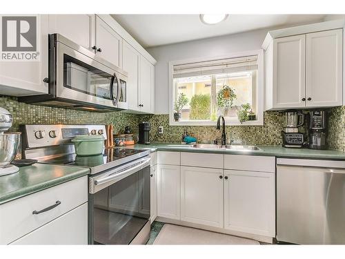 315 Primrose Road Unit# 205, Kelowna, BC - Indoor Photo Showing Kitchen With Double Sink