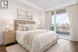 primary bedroom w/floor to ceiling window - 