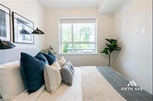 103 7936 206 Street, Langley, BC - Indoor Photo Showing Bedroom