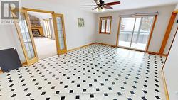 Dining room with deck access, ceiling fan - 