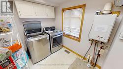 Main floor laundry, HW on demand - 