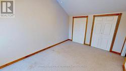 3rd bedroom wall to wall closet with organizer - 