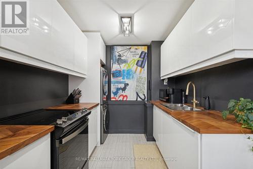 103 - 715 Don Mills Road, Toronto, ON - Indoor Photo Showing Kitchen With Double Sink