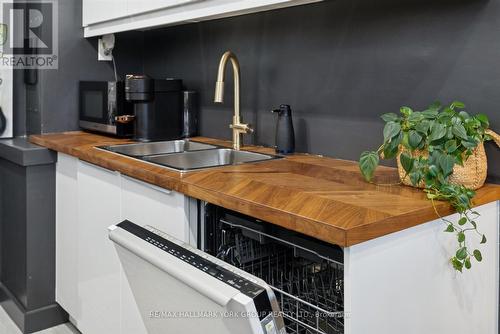 103 - 715 Don Mills Road, Toronto, ON - Indoor Photo Showing Kitchen With Double Sink