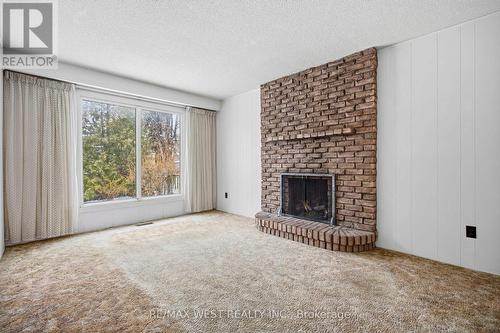7350 Bendigo Circle, Mississauga, ON - Indoor Photo Showing Living Room With Fireplace