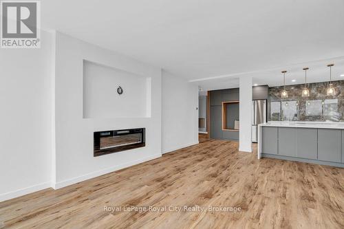 511 - 19 Woodlawn Road E, Guelph (Riverside Park), ON - Indoor With Fireplace