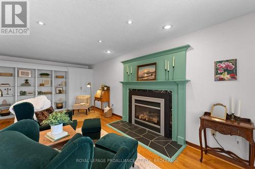 995 Auden Park Drive, Kingston (City Southwest), ON - Indoor Photo Showing Living Room With Fireplace