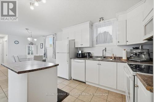 1 - 46 Cambridge Street, The Nation, ON - Indoor Photo Showing Kitchen With Double Sink