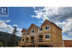 Construction update May 24th. Roofs on and windows in. - 