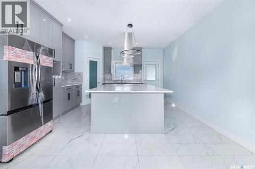 906 Bentley Manor, Saskatoon, SK - Indoor Photo Showing Kitchen With Upgraded Kitchen