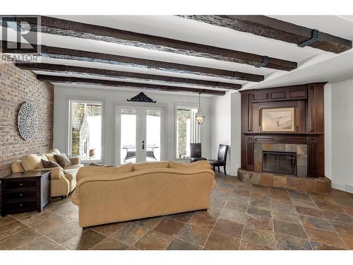 714 Kuipers Crescent, Kelowna, BC - Indoor Photo Showing Living Room With Fireplace
