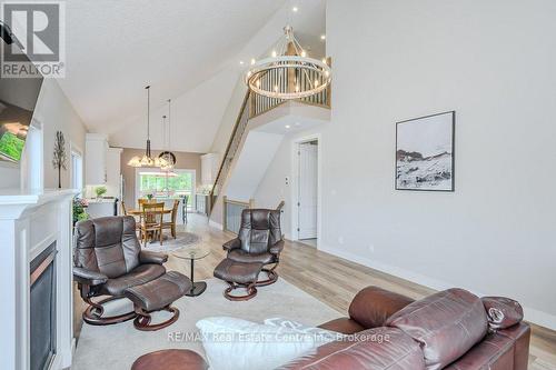 18 - 744 Nelson Street W, Norfolk (Port Dover), ON - Indoor Photo Showing Living Room With Fireplace