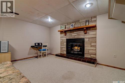31 Crossley Bay, Regina, SK - Indoor With Fireplace