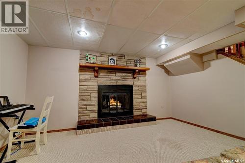 31 Crossley Bay, Regina, SK - Indoor With Fireplace