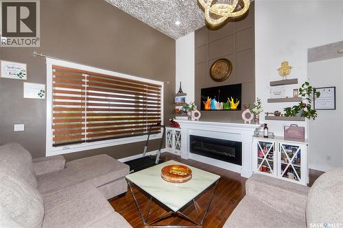 3234 37Th Street W, Saskatoon, SK - Indoor Photo Showing Living Room With Fireplace