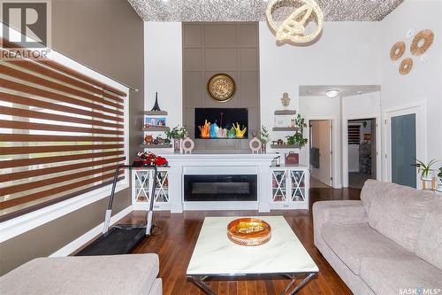 3234 37Th Street W, Saskatoon, SK - Indoor Photo Showing Living Room With Fireplace