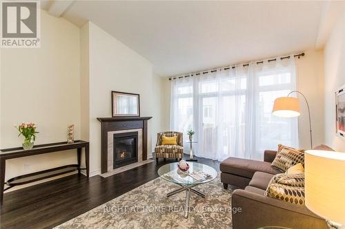 113 Passageway Way, Ottawa, ON - Indoor Photo Showing Living Room With Fireplace