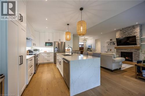 120 Newport Lane, Port Dover, ON - Indoor Photo Showing Kitchen With Fireplace With Upgraded Kitchen