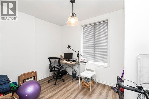Home office featuring light wood-style floors and baseboards - 57 New Street, Hamilton, ON - Indoor Photo Showing Office