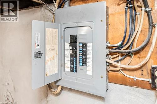 Utility room with electric panel - 57 New Street, Hamilton, ON - Indoor Photo Showing Basement