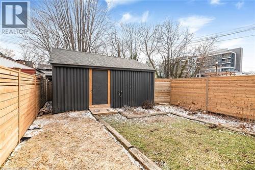 View of outbuilding with a fenced backyard - 57 New Street, Hamilton, ON - Outdoor