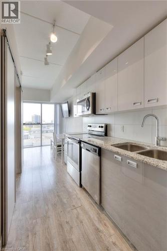 257 Hemlock Street Unit# 607, Waterloo, ON - Indoor Photo Showing Kitchen With Double Sink
