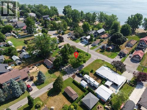 Aerial view of property's location featuring nearby suburban area and a large body of water - 181 Cedar Drive, Turkey Point, ON - Outdoor With Body Of Water With View