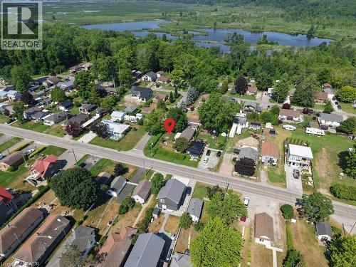 Aerial overview of property's location with a large body of water and nearby suburban area - 181 Cedar Drive, Turkey Point, ON - Outdoor With Body Of Water With View