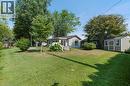 View of green lawn with a storage shed - 181 Cedar Drive, Turkey Point, ON  - Outdoor 