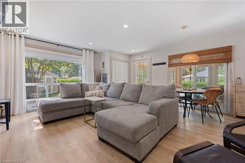Living area featuring plenty of natural light, light wood-type flooring, and recessed lighting - 181 Cedar Drive, Turkey Point, ON - Indoor Photo Showing Living Room