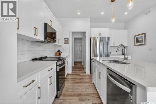 314 Keith Union, Saskatoon, SK - Indoor Photo Showing Kitchen With Double Sink With Upgraded Kitchen