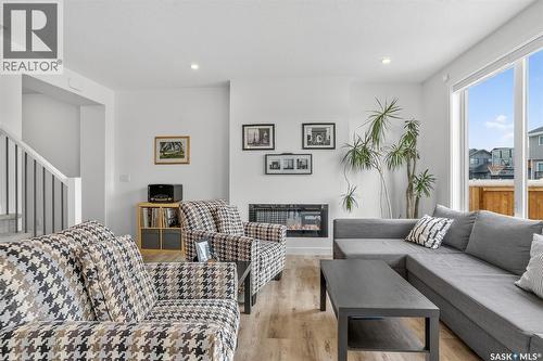 314 Keith Union, Saskatoon, SK - Indoor Photo Showing Living Room With Fireplace