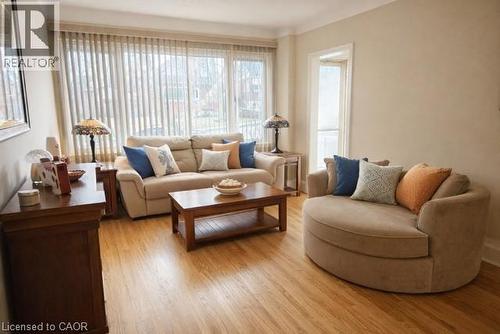 Living area featuring light wood-type flooring - 226 Auburn Avenue, Hamilton, ON - Indoor Photo Showing Living Room