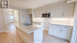 Redesigned kitchen with large island - 