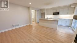 Redesigned kitchen with large island - 