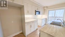 Redesigned kitchen with large island - 