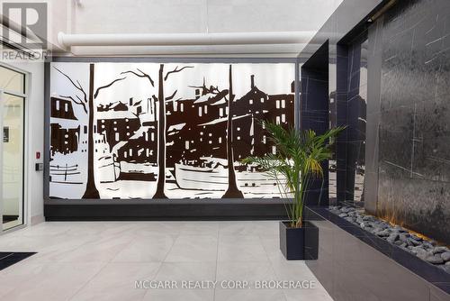 Art wall - 401 - 77 Yates Street, St. Catharines (Downtown), ON - Indoor Photo Showing Other Room