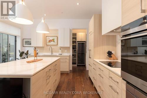 Walk in pantry with wine fridge - 401 - 77 Yates Street, St. Catharines (Downtown), ON - Indoor Photo Showing Kitchen With Upgraded Kitchen