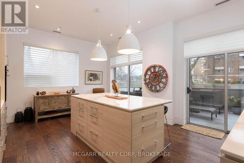 Patio doors to \"one of a kind\" east facing terrace - 401 - 77 Yates Street, St. Catharines (Downtown), ON - Indoor